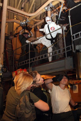 Illustration for article titled Seriously Amazing (and Funny) G.I. Joe Cosplay on a Real Aircraft Carrier